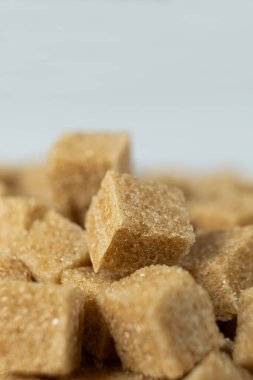 Rafine edilmemiş kahverengi baston makro küp demerara şekeri