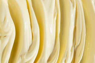 Lekeli mayonez sosunun soyut pişirme arka planı, üst görünüm, aşçılıktaki yaratıcılık