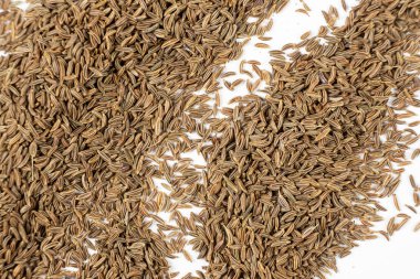 Kurutulmuş Kimyon Tohumları Beyaz Üst Görünümde Yakın Çekim Mutfak Malzemesi.