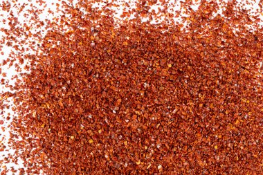 Koyu kırmızı biber tozu yakın çekim dokusu üst görünüm.