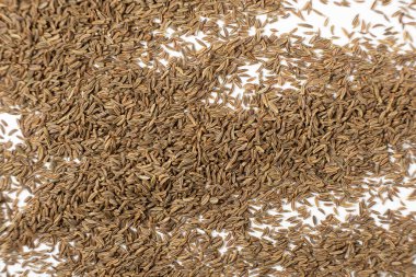 Kurutulmuş Kimyon Tohumları Beyaz Üst Görünümde Yakın Çekim Mutfak Malzemesi.