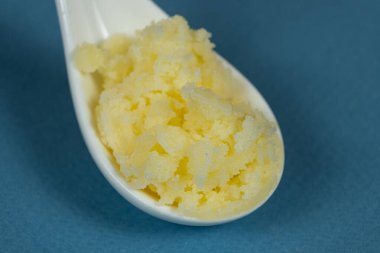 Geleneksel Hint Ghee in Spoon, Altın Doku