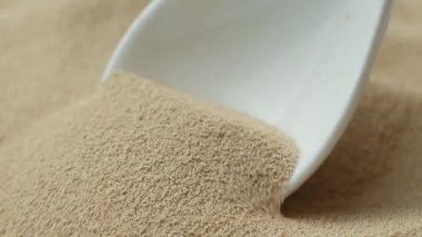 Pişirmek için Anında Kuru Mayanın Makro Dokuları