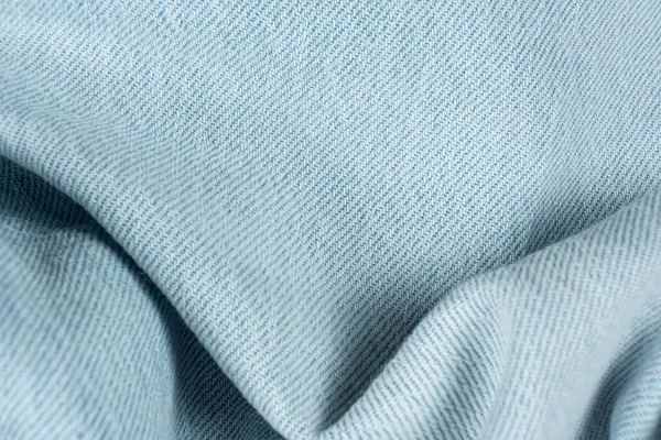 Dalgalı mavi kot kumaş deseni. Kapalı Doku.