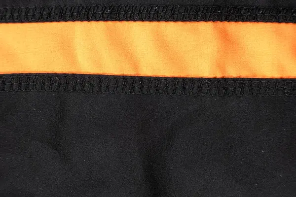 Eski yıpranmış polyester ve elastik kumaş, iplikler.