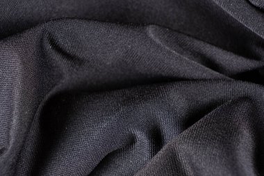 Eski yıpranmış polyester ve elastik kumaş, iplikler.