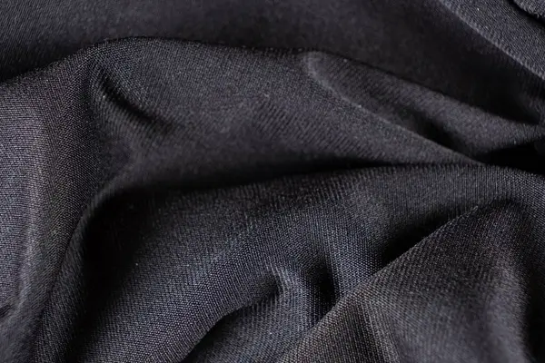 Eski yıpranmış polyester ve elastik kumaş, iplikler.