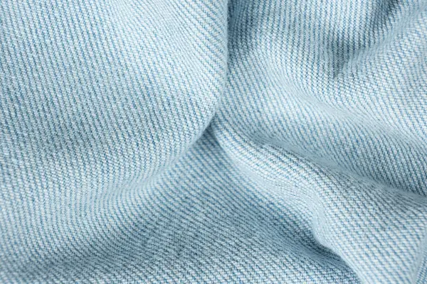 Kırışık Denim Kumaşının Gölgeler ve Dokularla Macro Görünümü