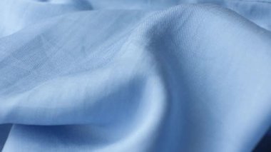 Biraz elastik, makro desenli polyester kumaş..