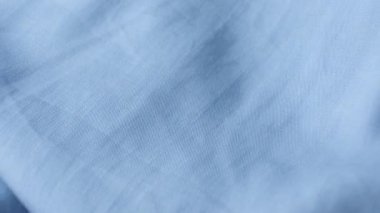 Biraz elastik, makro desenli polyester kumaş..