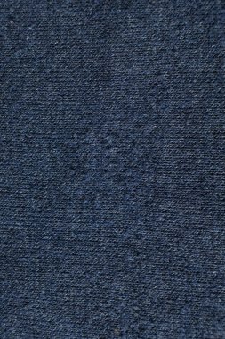 Eskimiş pamuk ve elastik kumaş, kumaş lifleri ve haplar..