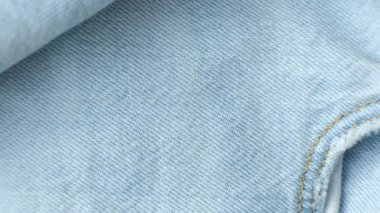 Pamuk mavi kotun makro kumaşı. Cep ve iplik dikişleri.