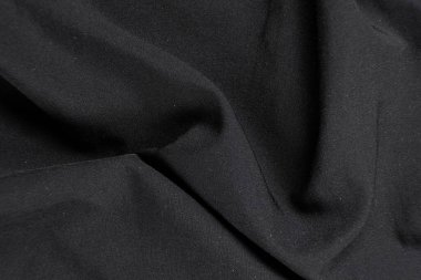 Eski yıpranmış polyester ve elastik kumaş, iplikler.