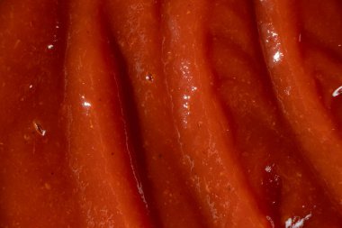 Doğal ketçapın makro dokusu. Soyut Aşçılık Arkaplanı Üst Görünümü.