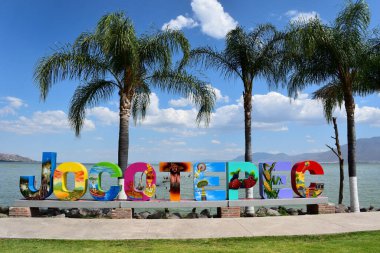 Jocotepec, Mexico - March 18 2023: Colorful tourist letters with the name of the town Jocotepec, on the boardwalk clipart