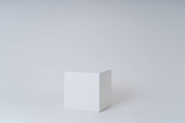 A white box in a white room