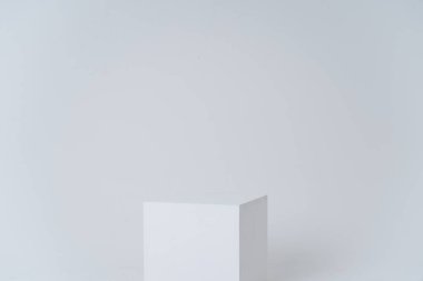 A white box in a white room