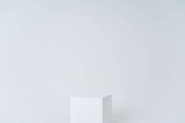 A white box in a white room