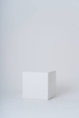 A white box in a white room