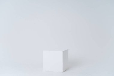 A white box in a white room