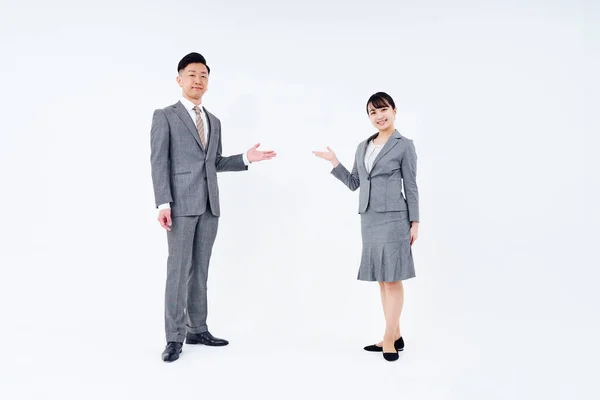Man Woman Suits Posing Guidance White Background – stockfoto