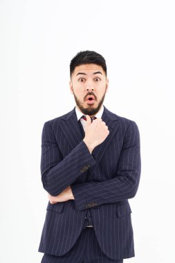 A man in a suit posing for discovery and inspiration and white background