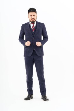 A man in a suit with a stressed expression and white background