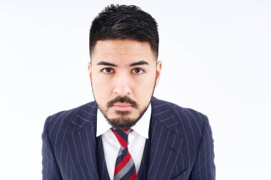 portrait of man in suit and white background