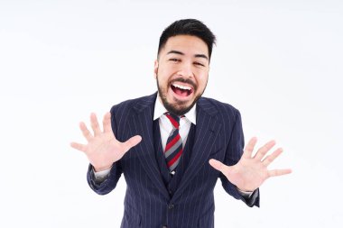 smiling man in suit and white background      