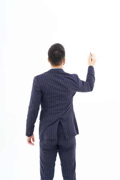 Man Suit Posing Write Pen White Background — 图库照片