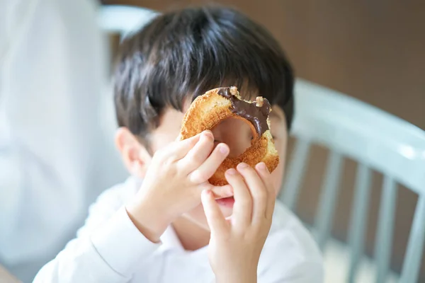 Mother Son Eating Donut Home — Stock Photo, Image