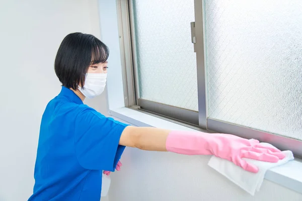 Woman Work Clothes Mask Wiping Room — Stock Photo, Image