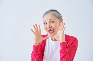 a senior woman cheering in the room                               clipart