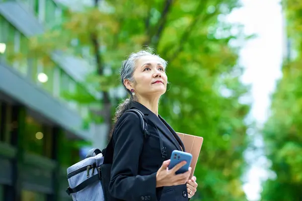 Smiling Gray Haired Business Woman Going Out — Stock Photo, Image