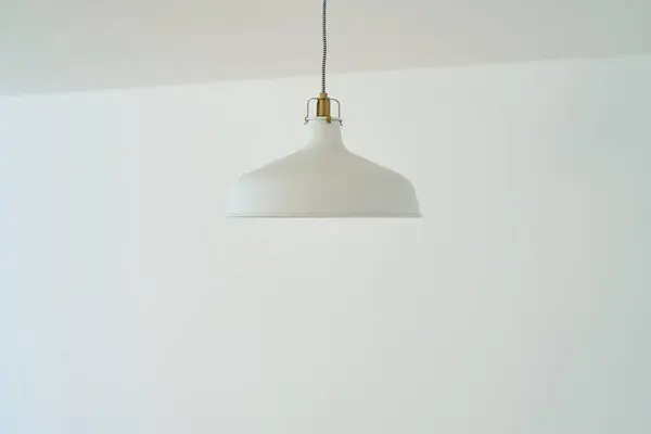Interior with white light fixtures and white walls