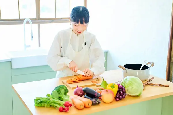 Young Woman Cutting Ingredients Knife Kitchen — Stock Photo, Image