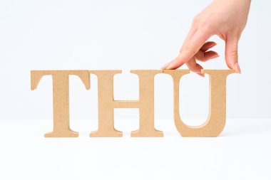 Wooden alphabet blocks arranged in the letter 