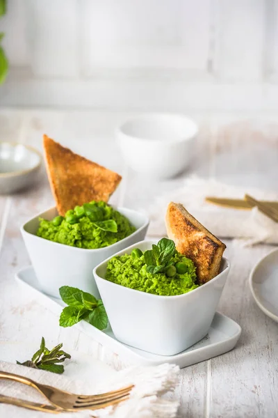 Two Bowls Pea Puree Basil Mint Roasted Bread White Wooden — Stock Photo, Image