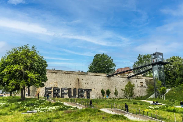 stock image Erfurt, Germany - May 20, 2023: The lettering of the city of Erfurt in Germany in large capital letters that are filled with plants. Copy space.