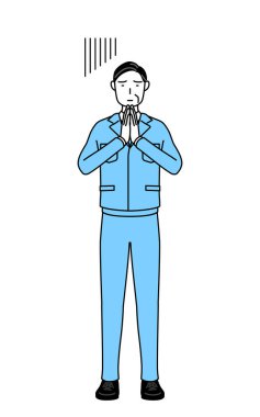 Yönetim, yöneticiler, fabrika müdürü, iş yerindeki bir adam ellerini vücudunun önüne koyup özür diliyor..