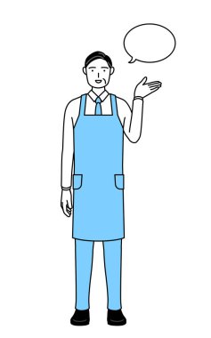 Önlüklü kıdemli bir adam yön tarifi yapıyor..