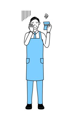 Önlüklü kıdemli bir adam banka defterine bakıyor ve bunalımda..