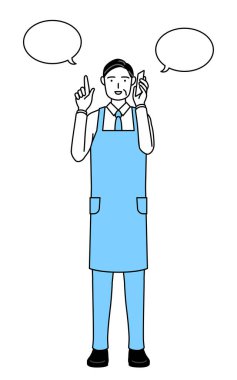 Önlüklü kıdemli bir adam telefonla konuşurken....