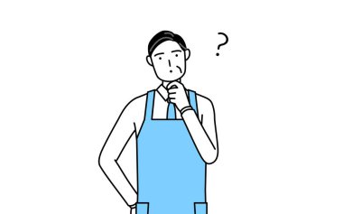 Soruları olan önlüklü kıdemli bir adam..