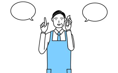 Önlüklü kıdemli bir adam telefonla konuşurken....