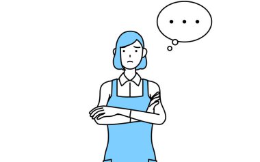 Önlüklü bir kadın, kollarını kavuşturmuş, düşünüyor..