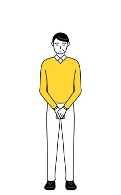 Emekli son sınıflar, orta yaşlı bir adam, elleri bağlı eğiliyor..