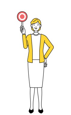 Emekli yaşlılar, orta yaşlı kadınlar, doğru cevabı gösteren yumuşak bir sopa tutuyorlar..