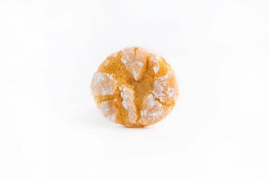 On a white background, one cookie with cracks.Sweet food concept.