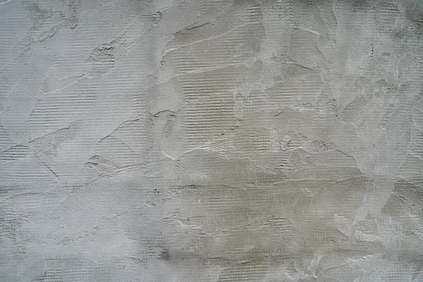 The texture of the cement wall with the joints after the trowel   